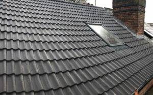 New tiled roof with scaffold