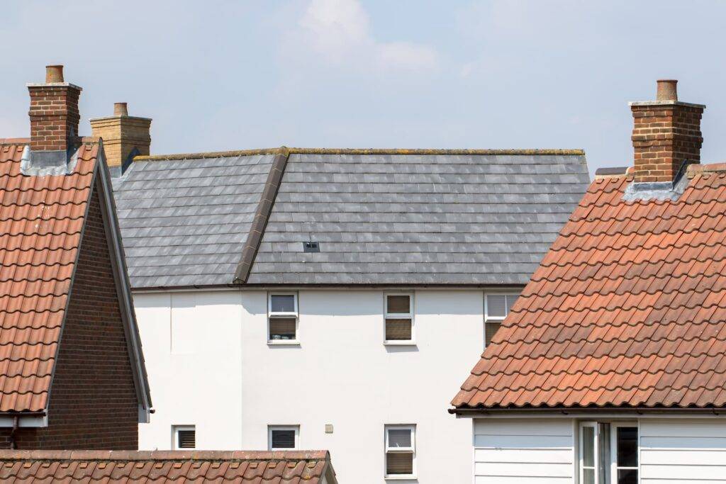 houses with different roofing materials